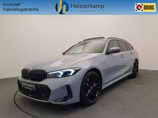 bmw-3-serie-touring-330e-m-sport-wegklapbare-trekhaak,-panoramadak,-acc
