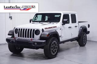 jeep-gladiator-3.6-v6-285-pk-rubicon-grijs-kenteken-2-zits-navi-leder-zwart,-adapt.-cruise,-targa-da